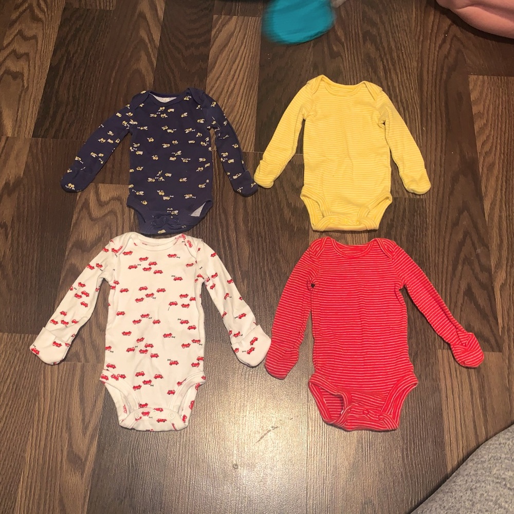 A bunch of Baby Onesies